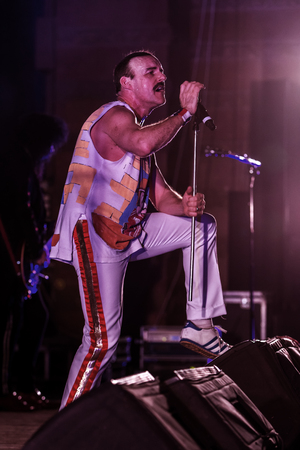 ODESSA, UKRAINE - MARCH 16, 2019: Rock concert Queen tribute show, Bohemian night of the Queen. Rock band copies the performance of the legendary Freddy Merqury group Queen. Rock concert queenのeditorial素材
