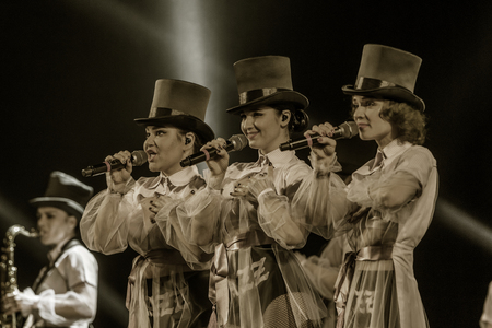 ODESSA, UKRAINE - MARCH 17, 2019: Bright music show FREEDOM JAZZ. Beautiful female jazz band on stage in a bright musical jazz show. Sexy women musicians on stage in an erotic musical performanceのeditorial素材