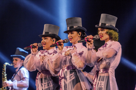 ODESSA, UKRAINE - MARCH 17, 2019: Bright music show FREEDOM JAZZ. Beautiful female jazz band on stage in a bright musical jazz show. Sexy women musicians on stage in an erotic musical performanceのeditorial素材