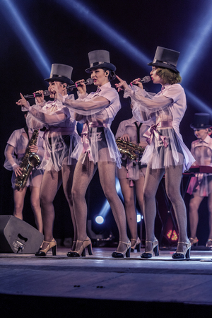 ODESSA, UKRAINE - MARCH 17, 2019: Bright music show FREEDOM JAZZ. Beautiful female jazz band on stage in a bright musical jazz show. Sexy women musicians on stage in an erotic musical performanceのeditorial素材