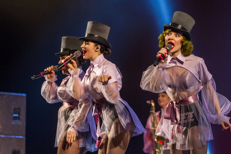 ODESSA, UKRAINE - MARCH 17, 2019: Bright music show FREEDOM JAZZ. Beautiful female jazz band on stage in a bright musical jazz show. Sexy women musicians on stage in an erotic musical performanceのeditorial素材