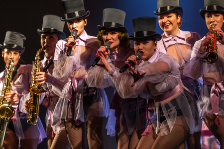 ODESSA, UKRAINE - MARCH 17, 2019: Bright music show FREEDOM JAZZ. Beautiful female jazz band on stage in a bright musical jazz show. Sexy women musicians on stage in an erotic musical performanceのeditorial素材
