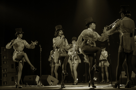 ODESSA, UKRAINE - MARCH 17, 2019: Bright music show FREEDOM JAZZ. Beautiful female jazz band on stage in a bright musical jazz show. Sexy women musicians on stage in an erotic musical performanceのeditorial素材