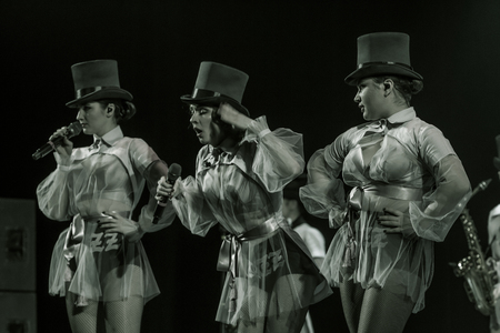 ODESSA, UKRAINE - MARCH 17, 2019: Bright music show FREEDOM JAZZ. Beautiful female jazz band on stage in a bright musical jazz show. Sexy women musicians on stage in an erotic musical performanceのeditorial素材