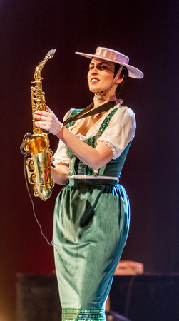 ODESSA, UKRAINE - MARCH 17, 2019: Bright music show FREEDOM JAZZ. Beautiful female jazz band on stage in a bright musical jazz show. Sexy women musicians on stage in an erotic musical performanceのeditorial素材