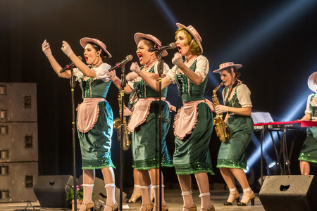 ODESSA, UKRAINE - MARCH 17, 2019: Bright music show FREEDOM JAZZ. Beautiful female jazz band on stage in a bright musical jazz show. Sexy women musicians on stage in an erotic musical performanceのeditorial素材