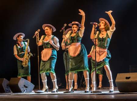 ODESSA, UKRAINE - MARCH 17, 2019: Bright music show FREEDOM JAZZ. Beautiful female jazz band on stage in a bright musical jazz show. Sexy women musicians on stage in an erotic musical performanceのeditorial素材