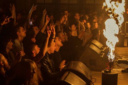 ODESSA, UKRAINE - March 23, 2019: viewers in auditorium of concert hall emotionally meet their favorite performers. Audience in theater hall. Viewers like performance on stageのeditorial素材