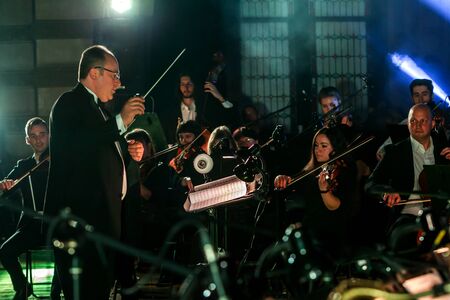 ODESSA, UKRAINE - March 23, 2019: Symphony orchestra concert on theater stage. Musicians of State...