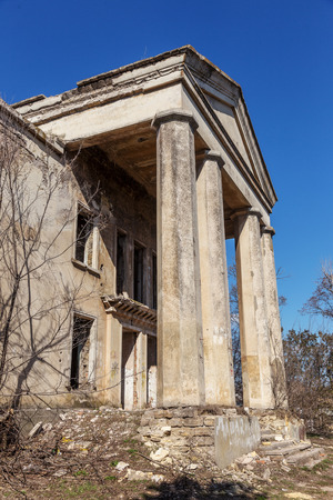 Mystical interior, ruins of an abandoned ruined building of house of culture, theater of USSR. Old destroyed walls, corridor with garbage and dirt. Destroyed molding, plaster ornaments, bas-reliefの写真素材