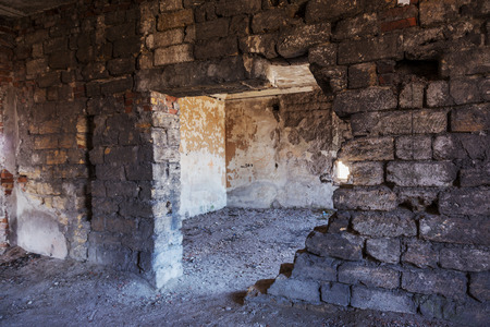 Mystical interior, ruins of an abandoned ruined building of house of culture, theater of USSR. Old destroyed walls, corridor with garbage and dirt. Destroyed molding, plaster ornaments, bas-reliefの写真素材