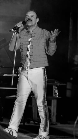 ODESSA, UKRAINE - MARCH 16, 2019: Rock concert Queen tribute show, Bohemian night of the Queen. Rock band copies the performance of the legendary Freddy Merqury group Queen. Rock concert Queenのeditorial素材