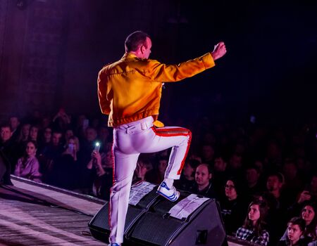 ODESSA, UKRAINE - MARCH 16, 2019: Rock concert Queen tribute show, Bohemian night of the Queen. Rock band copies the performance of the legendary Freddy Merqury group Queen. Rock concert Queenのeditorial素材