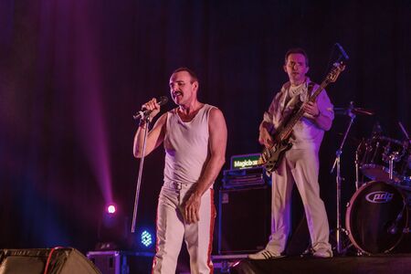 ODESSA, UKRAINE - MARCH 16, 2019: Rock concert Queen tribute show, Bohemian night of the Queen. Rock band copies the performance of the legendary Freddy Merqury group Queen. Rock concert Queenのeditorial素材