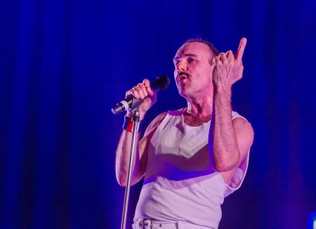 ODESSA, UKRAINE - MARCH 16, 2019: Rock concert Queen tribute show, Bohemian night of the Queen. Rock band copies the performance of the legendary Freddy Merqury group Queen. Rock concert Queenのeditorial素材