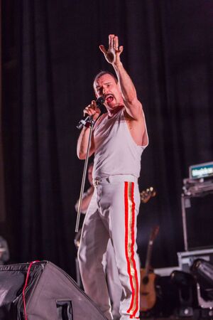 ODESSA, UKRAINE - MARCH 16, 2019: Rock concert Queen tribute show, Bohemian night of the Queen. Rock band copies the performance of the legendary Freddy Merqury group Queen. Rock concert Queenのeditorial素材