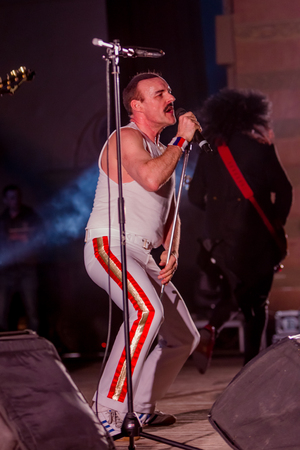 ODESSA, UKRAINE - MARCH 16, 2019: Rock concert Queen tribute show, Bohemian night of the Queen. Rock band copies the performance of the legendary Freddy Merqury group Queen. Rock concert Queenのeditorial素材