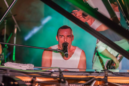 ODESSA, UKRAINE - MARCH 16, 2019: Rock concert Queen tribute show, Bohemian night of the Queen. Rock band copies the performance of the legendary Freddy Merqury group Queen. Rock concert Queenのeditorial素材