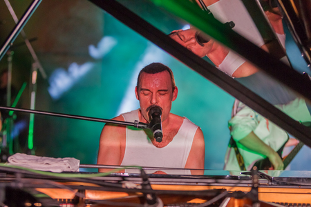 ODESSA, UKRAINE - MARCH 16, 2019: Rock concert Queen tribute show, Bohemian night of the Queen. Rock band copies the performance of the legendary Freddy Merqury group Queen. Rock concert Queenのeditorial素材