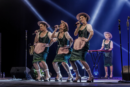 ODESSA, UKRAINE - MARCH 17, 2019: Bright music show FREEDOM JAZZ. Beautiful female jazz band on stage in a bright musical jazz show. Sexy women musicians on stage in an erotic musical performanceのeditorial素材