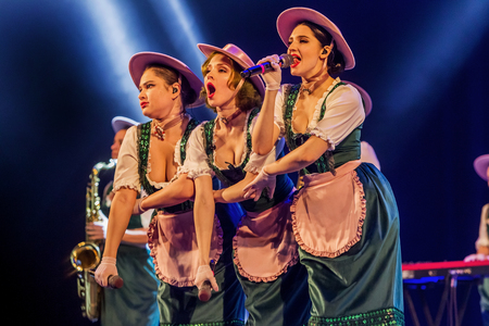 ODESSA, UKRAINE - MARCH 17, 2019: Bright music show FREEDOM JAZZ. Beautiful female jazz band on stage in a bright musical jazz show. Sexy women musicians on stage in an erotic musical performanceのeditorial素材