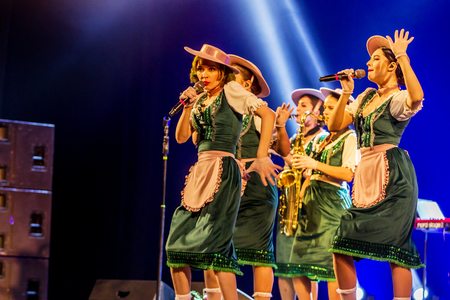 ODESSA, UKRAINE - MARCH 17, 2019: Bright music show FREEDOM JAZZ. Beautiful female jazz band on stage in a bright musical jazz show. Sexy women musicians on stage in an erotic musical performanceのeditorial素材