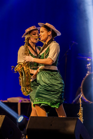 ODESSA, UKRAINE - MARCH 17, 2019: Bright music show FREEDOM JAZZ. Beautiful female jazz band on stage in a bright musical jazz show. Sexy women musicians on stage in an erotic musical performanceのeditorial素材