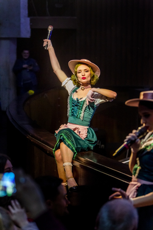 ODESSA, UKRAINE - MARCH 17, 2019: Bright music show FREEDOM JAZZ. Beautiful female jazz band on stage in a bright musical jazz show. Sexy women musicians on stage in an erotic musical performanceのeditorial素材