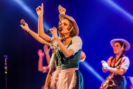 ODESSA, UKRAINE - MARCH 17, 2019: Bright music show FREEDOM JAZZ. Beautiful female jazz band on stage in a bright musical jazz show. Sexy women musicians on stage in an erotic musical performanceのeditorial素材
