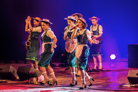 ODESSA, UKRAINE - MARCH 17, 2019: Bright music show FREEDOM JAZZ. Beautiful female jazz band on stage in a bright musical jazz show. Sexy women musicians on stage in an erotic musical performanceのeditorial素材