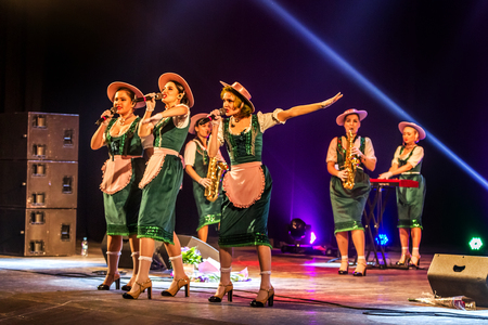 ODESSA, UKRAINE - MARCH 17, 2019: Bright music show FREEDOM JAZZ. Beautiful female jazz band on stage in a bright musical jazz show. Sexy women musicians on stage in an erotic musical performanceのeditorial素材
