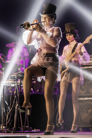 ODESSA, UKRAINE - MARCH 17, 2019: Bright music show FREEDOM JAZZ. Beautiful female jazz band on stage in a bright musical jazz show. Sexy women musicians on stage in an erotic musical performanceのeditorial素材