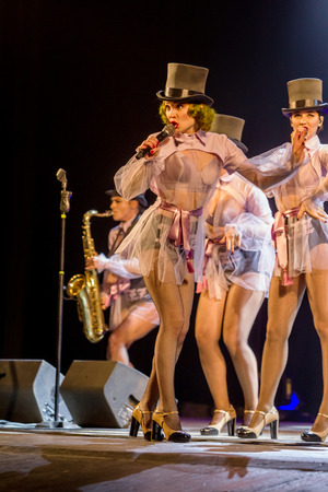 ODESSA, UKRAINE - MARCH 17, 2019: Bright music show FREEDOM JAZZ. Beautiful female jazz band on stage in a bright musical jazz show. Sexy women musicians on stage in an erotic musical performanceのeditorial素材