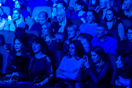 Odessa, Ukraine - April 12, 2019: Crowd of spectators at rock concert ALEKSEEV during music show....