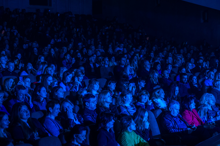 Odessa, Ukraine - April 12, 2019: Crowd of spectators at rock concert ALEKSEEV during music show. Crowds of happy people enjoy rock concert, raise their hands and clap their hands, audience on podiumのeditorial素材