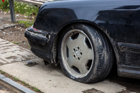 ODESSA, UKRAINE - MAY 8, 2019: Car accident on the road in the city. Black Mercedes lost control and drove to the passenger bench at the bus stop. Selective focusのeditorial素材