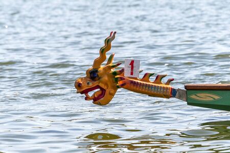 Odessa, Ukraine - June 2, 2019: Dragon Boat Racing during Dragon Boat Festival, DragBoat Racing is popular traditional Chinese water sport. Dragboat on river. People rowing oars in summer raceのeditorial素材