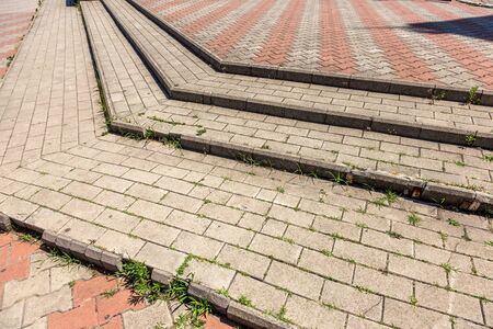 Street background of old paving stone. Background of old cobblestone pavement close-up. Old paving...