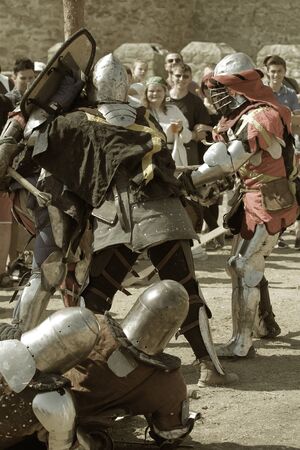 ODESSA, UKRAINE - JULY 20, 2019: Battle of the Knights with medieval weapons at the medieval...