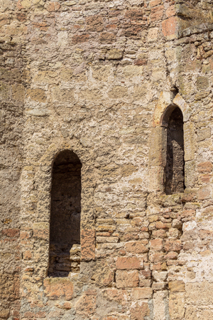 Ancient stone and brick Akkerman fortress, Belgorod-Dniester, Ukraine 13th century, part of the southeastern defensive wall. Fragment of the fortress wall, an ancient tile on a defensive towerのeditorial素材
