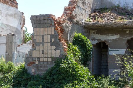 Ruined house. Remains of old houses. Apocalypse. Abandoned city. City of ghosts. Ruins of old...