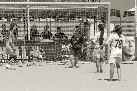 Odessa, Ukraine-July 21, 2019: Beach Soccer Championship among amateur women on beach. Soccer in sand. Young beautiful girls playing beach football on sand of city beach. Football on sandのeditorial素材