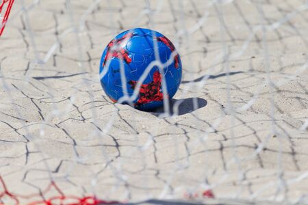 Odessa, Ukraine-July 21, 2019: Beach Soccer Championship among amateur women on beach. Soccer in sand. Young beautiful girls playing beach football on sand of city beach. Football on sandのeditorial素材