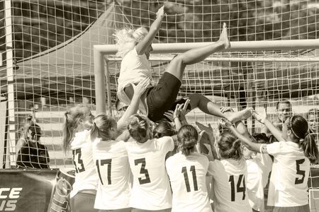 Odessa, Ukraine - July 21, 2019: Beach soccer championship for women on beach. Football in sand....