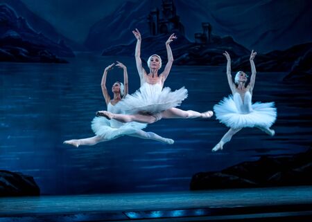 ODESSA, UKRAINE -JULY22, 2019: ballet. Classical ballet on stage of Odessa Opera Theater. Ballet dancers on stage dance classical works of Swan Lake. Form of artistic ball dance on stage of theaterのeditorial素材
