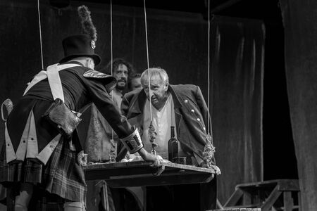 ODESSA, UKRAINE - August 27, 2019 A fragment of a theatrical production of the historical drama "Corsican" about the fate of Napoleon Bonaparte on St. Helena performed by the Kiev theater troupeのeditorial素材