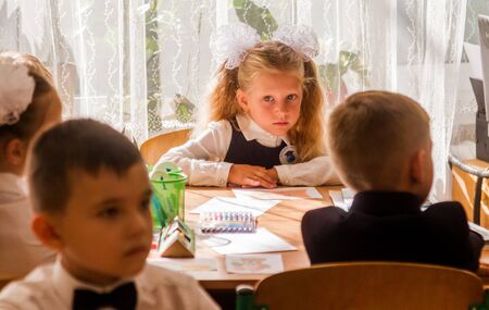 ODESSA UKRAINE - September 1, 2019: First call. 1 September is Day of Knowledge. Solemn school line, first grade, back to school. School holiday Knowledge Day. Little schoolchildren, first gradersのeditorial素材