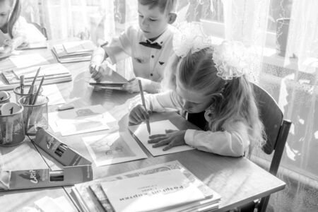 ODESSA UKRAINE - September 1, 2019: First call. 1 September is Day of Knowledge. Solemn school line, first grade, back to school. School holiday Knowledge Day. Little schoolchildren, first gradersのeditorial素材