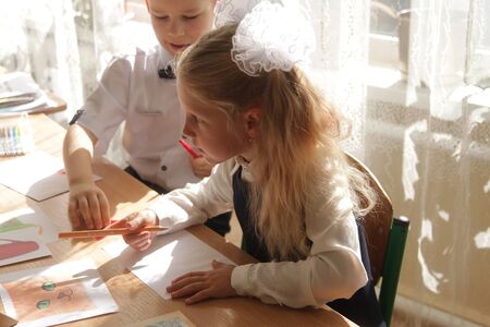 ODESSA UKRAINE - September 1, 2019: First call. 1 September is Day of Knowledge. Solemn school line, first grade, back to school. School holiday Knowledge Day. Little schoolchildren, first gradersのeditorial素材