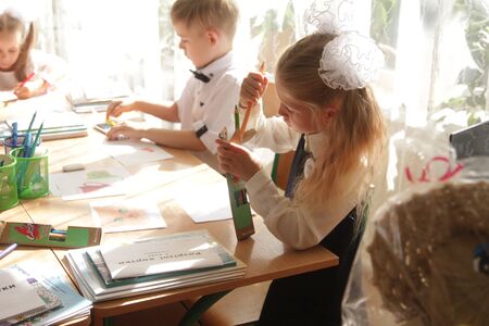 ODESSA UKRAINE - September 1, 2019: First call. 1 September is Day of Knowledge. Solemn school line, first grade, back to school. School holiday Knowledge Day. Little schoolchildren, first gradersのeditorial素材